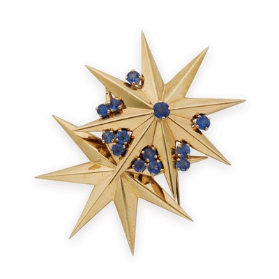 Lot 310 - Gold and Sapphire Star Clip-Brooch