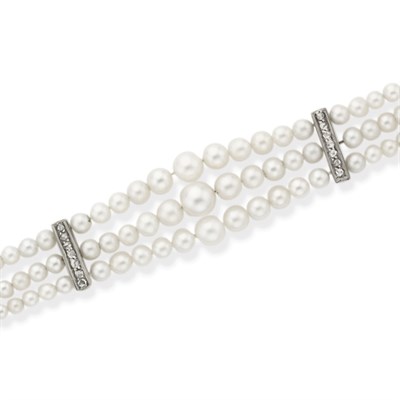 Lot 116 - Triple Strand Natural Pearl and Diamond Bracelet