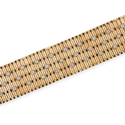 Lot 337 - Wide Two-Color Gold and Diamond Bracelet