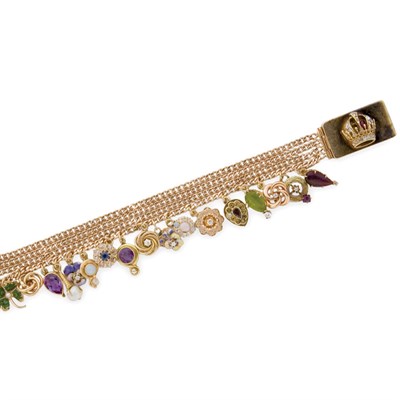 Lot 350 - Four Strand Gold, Gem-Set and Diamond Charm Bracelet