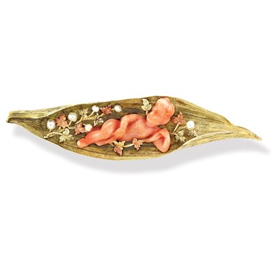 Lot 415 - Gold, Carved Angel Skin Coral Putti and Seed Pearl Brooch