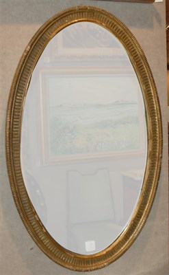 Lot 340 - Neoclassical Style Gilt-Wood Oval Mirror...