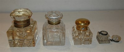 Lot 452 - Four Metal Mounted Glass Ink Bottles