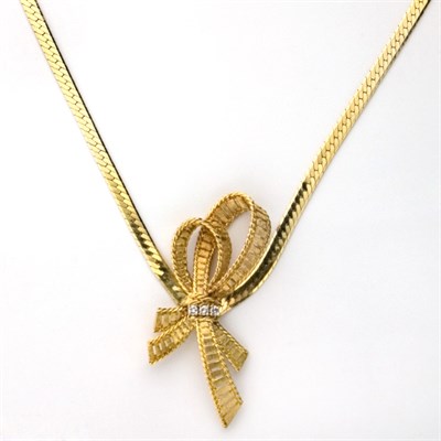 Lot 400 - Gold and Diamond Bow Chain Necklace