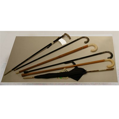 Lot 485 - Group of Five Canes and an Umbrella; Together...