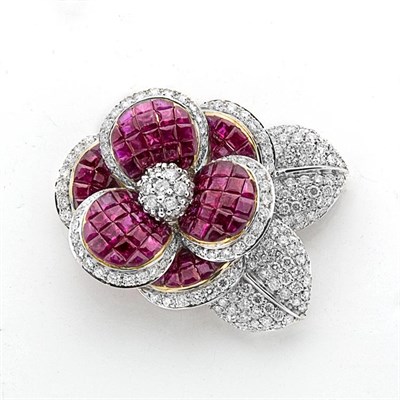 Lot 872 - Invisibly-Set Ruby and Diamond Flower Brooch