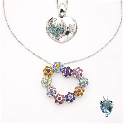 Lot 528 - Group of Three White Gold and Gem-Set Pendants and  Two Chains