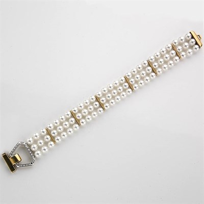 Lot 691 - Triple Strand Cultured Pearl Bracelet with Gold and Diamond Clasp