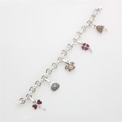 Lot 843 - White Gold, Gem-Set and Diamond Charm Bracelet