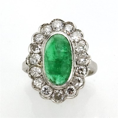 Lot 865 - Cabochon Emerald and Diamond Ring
