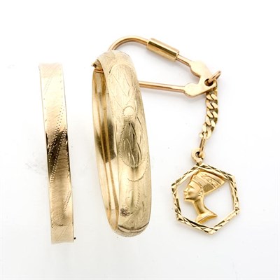 Lot 83 - Group of Assorted Gold  Bangle Bracelets and One Key Ring