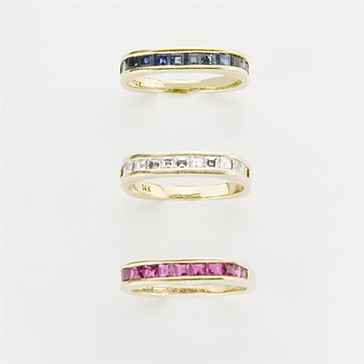 Lot 880 - Three Ruby, Diamond and Sapphire Half Around Stacking Rings
