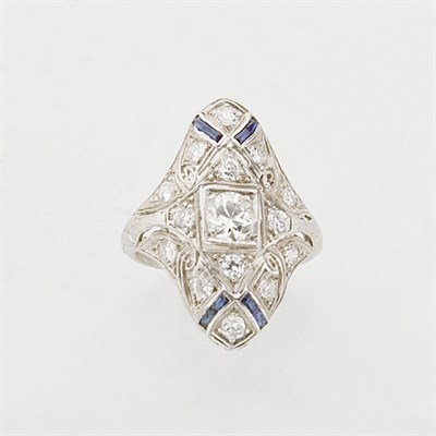 Lot 799 - Platinum, Diamond and Synthetic Sapphire Ring