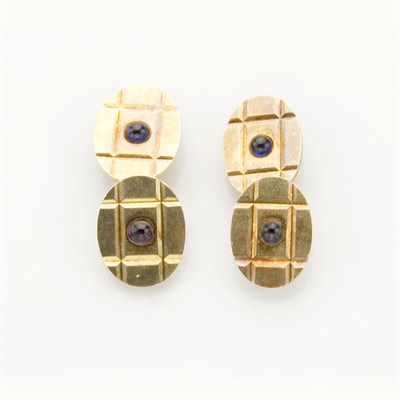 Lot 288 - Pair of Gold and Cabochon Sapphire Cufflinks, Tiffany & Co.