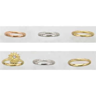 Lot 592 - Seven Tricolor Gold Stacking Band Rings