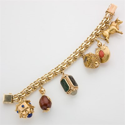 Lot 557 - Gold Charm Bracelet