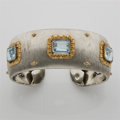 Lot 250 - Two-Color Gold and Aquamarine Cuff Bangle