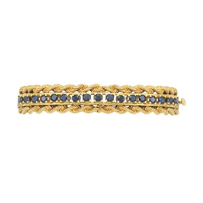 Lot 450 - Gold and Sapphire Bangle Bracelet
