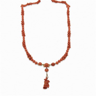 Lot 207 - Antique Coral and Carved Coral Bead, Gold and Carved Coral Pendant-Necklace