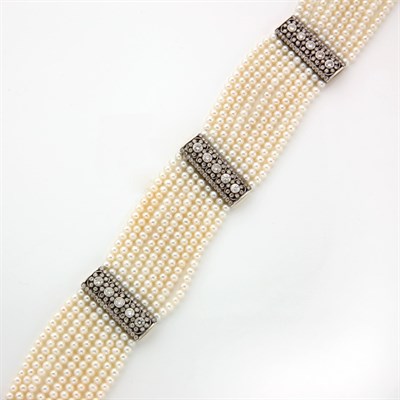 Lot 610 - Nine Strand Freshwater Pearl and Diamond Choker Necklace