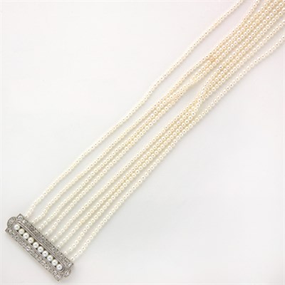 Lot 505 - Eight Strand Natural Pearl Necklace with Pearl and Diamond Clasp