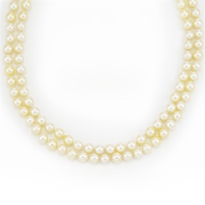 Lot 499 - Long Double Strand Cultured Pearl Necklace with Gold and Diamond Clasp