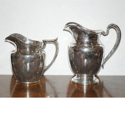Lot 357 - Two American Sterling Silver Water Pitchers...