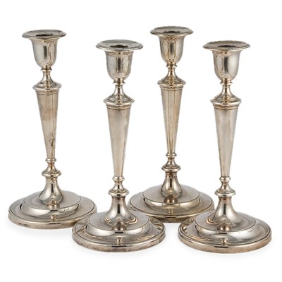 Lot 276 - Set of Four English Silver Candlesticks...