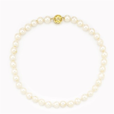 Lot 141 - Semi-Baroque Cultured Pearl Necklace with Yellow Sapphire Clasp