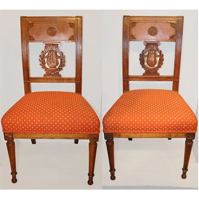Lot 587 - Set of Four Directoire Walnut Side Chairs...