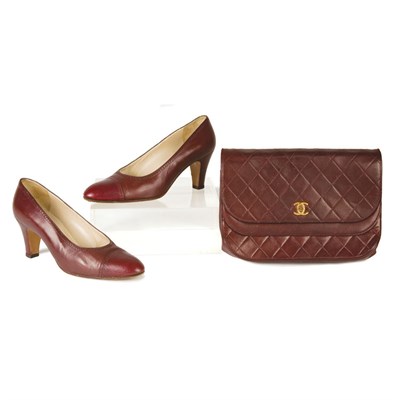 Lot 155 - Chanel Burgundy Calf Clutch and Pair of Pumps...