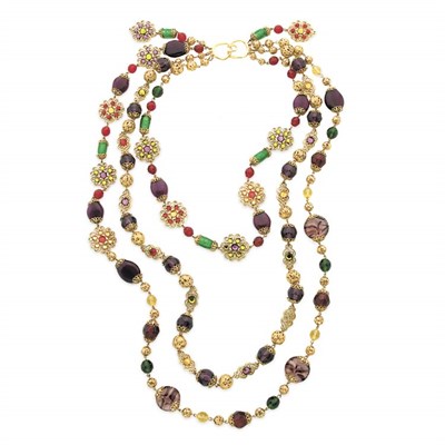 Lot 313 - Triple Strand Necklace Gold-tone metal...