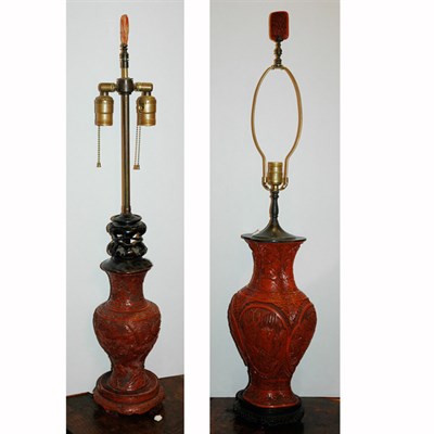 Lot 151 - Two Chinese Carved Red Lacquered Lamps Height...
