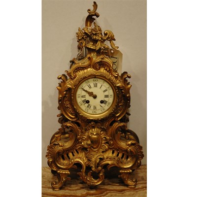 Lot 546 - Louis XV Style Gilt-Bronze Clock The cartouche-...