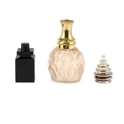 Lot 334 - Two R. Lalique Molded Glass Perfume Bottles...