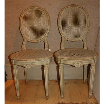 Lot 382 - Set of Four Louis XVI Style Painted and Caned...