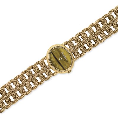 Lot 295 - Gold and Tiger's-Eye Bracelet-Watch, Bueche Girod