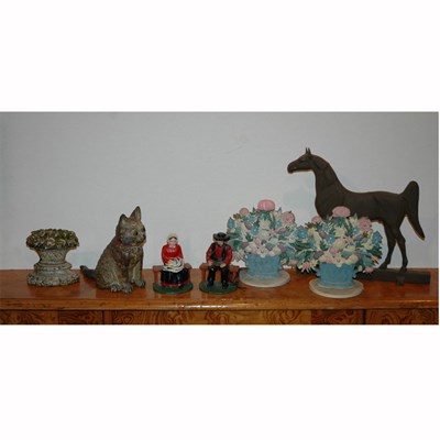 Lot 311 - Group of Eight Painted Iron Door Stops...