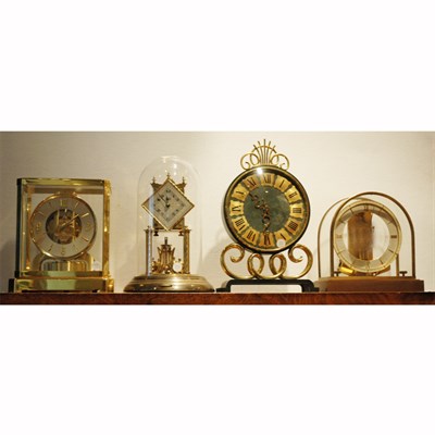 Lot 598 - Group of Four Glass and Brass Mantel Clocks...