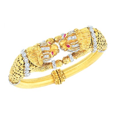 Lot 411 - Gold, Ruby and Diamond Lion Head Bangle Bracelet