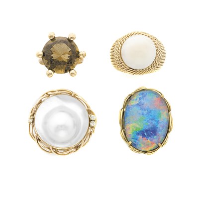 Lot 566 - Four Gold and Stone Rings