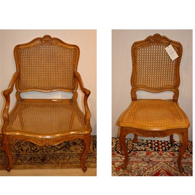 Lot 305 - Set of Eight Louis XV Walnut Dining Chairs...