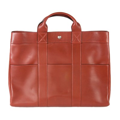 Lot 253 - Hermes Burgundy Calf Tote Fitted with exterior...
