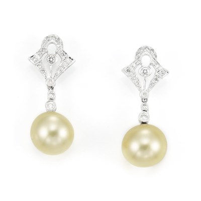 Lot 421 - Pair of Diamond and Golden Cultured Pearl Pendant-Earrings