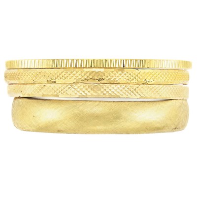 Lot 255 - Four Gold Bangle Bracelets