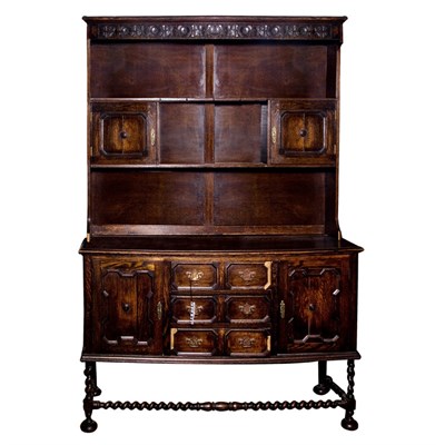 Lot 332 - Tudor Style Carved and Dark Stained Oak Hutch...