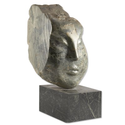 Lot 259 - Carved Hardstone Head On a black pedestal....