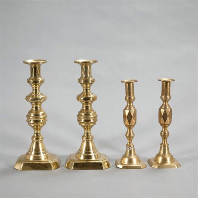 Lot 452 - Two Pairs of Georgian Style Brass Candlesticks...