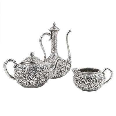 Lot 317 - American Sterling Silver Four-Piece Repousse...