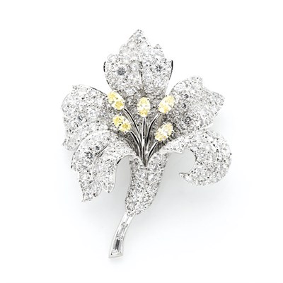 Lot 425 - White Gold, Diamond and Yellow Diamond Flower Brooch